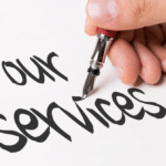 photo of someone writing the word "services"